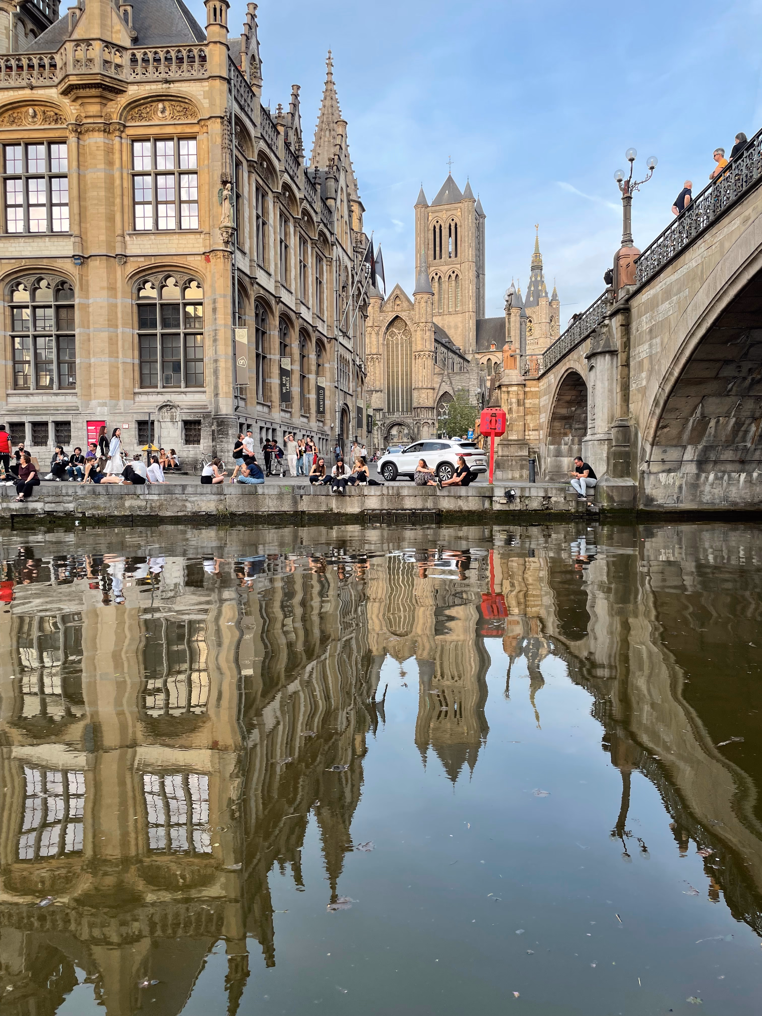 Gothic church reflected in the canal water of Ghent.