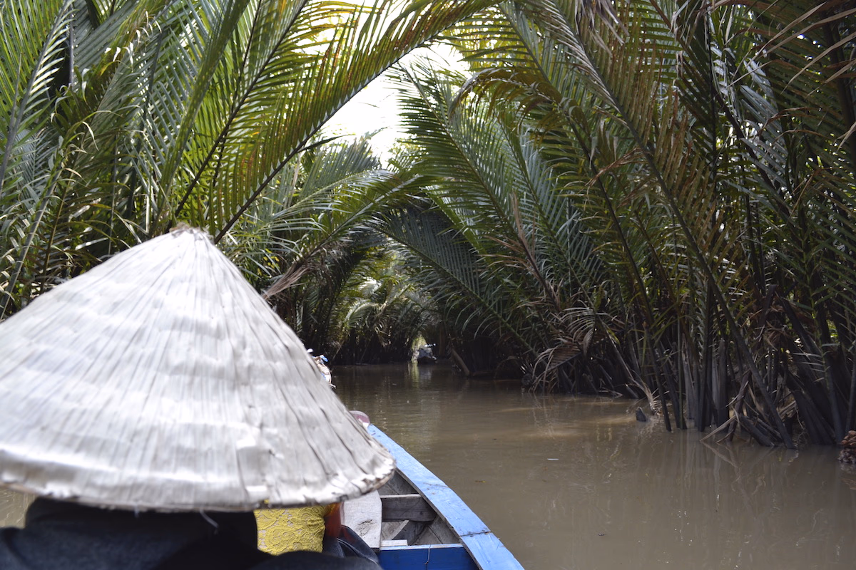 On a rowing boat in Mekong Delta.