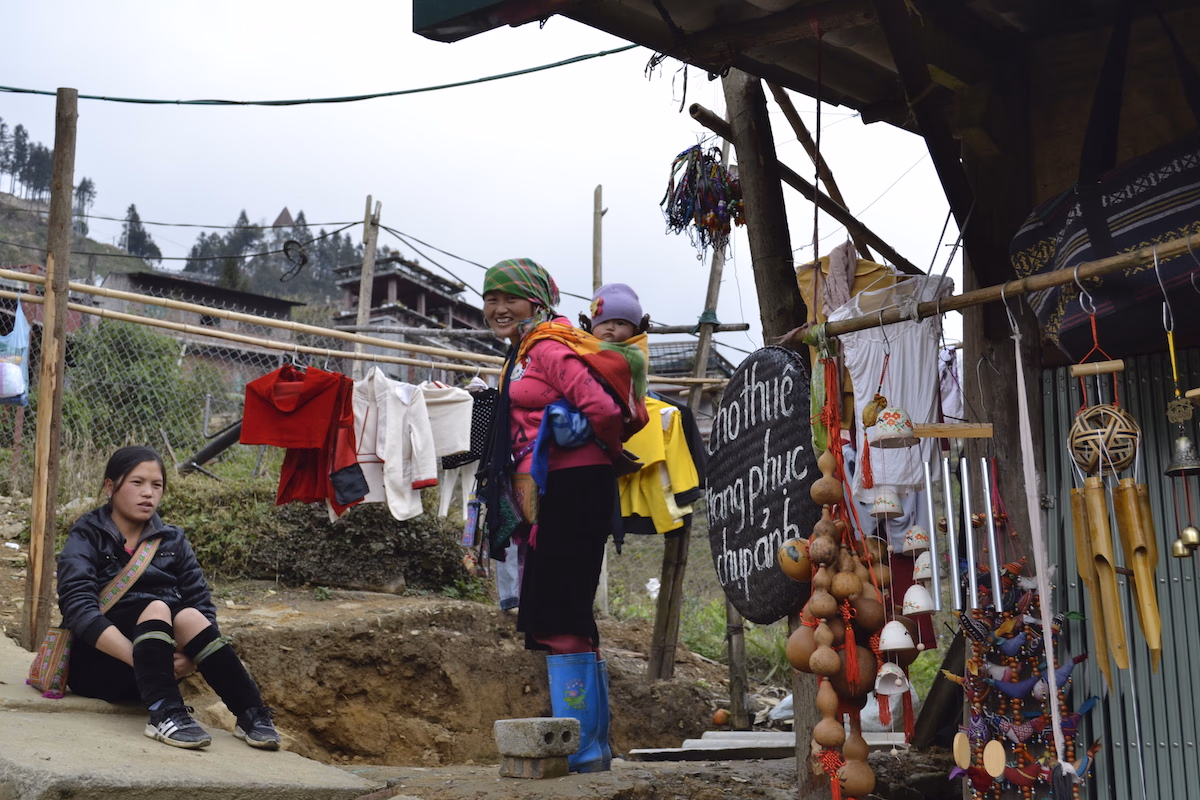Local woman carrying a baby.