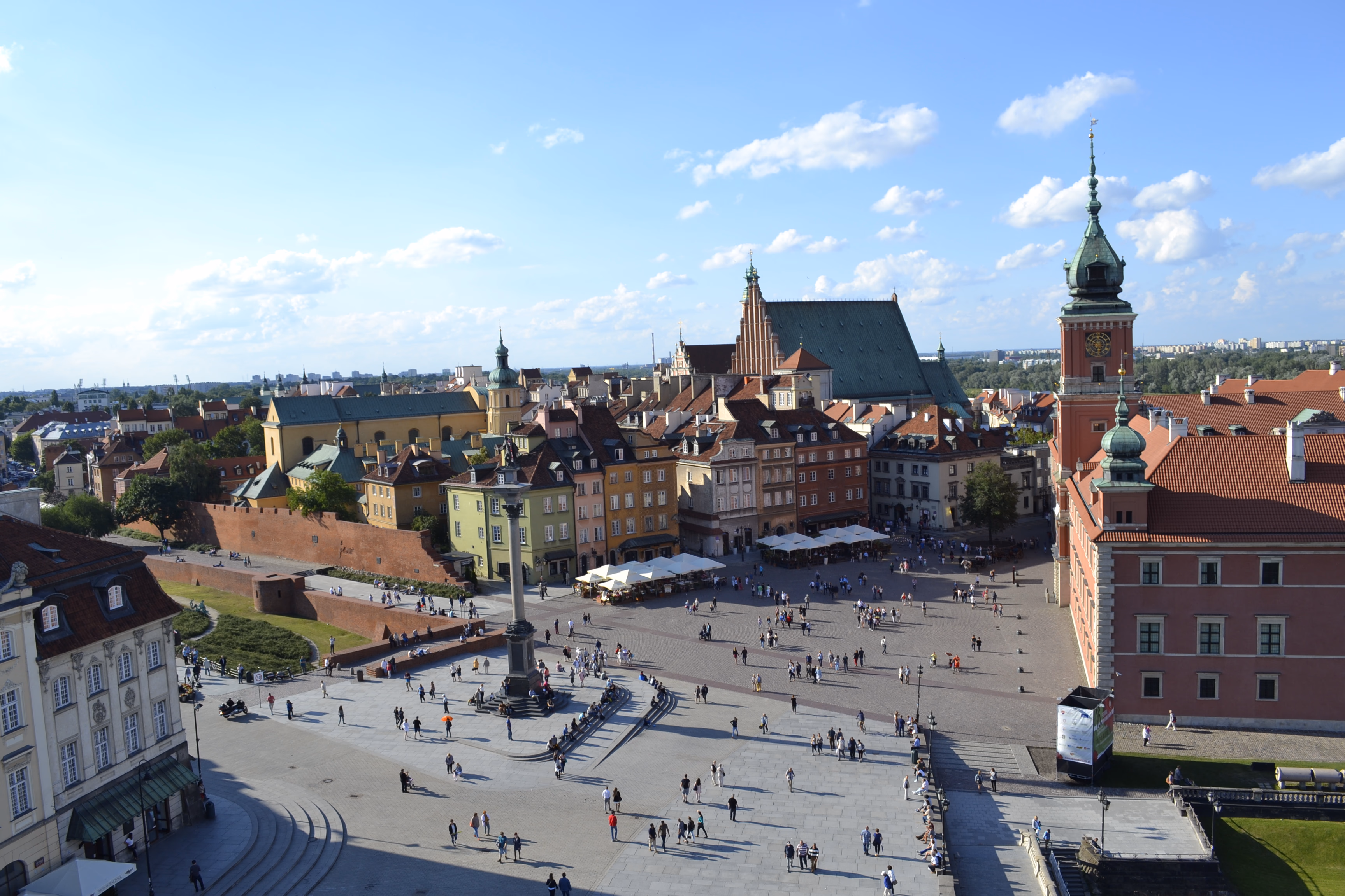 Poland: Market squares, brick churches, and cities rebuilt with stubborn grace.